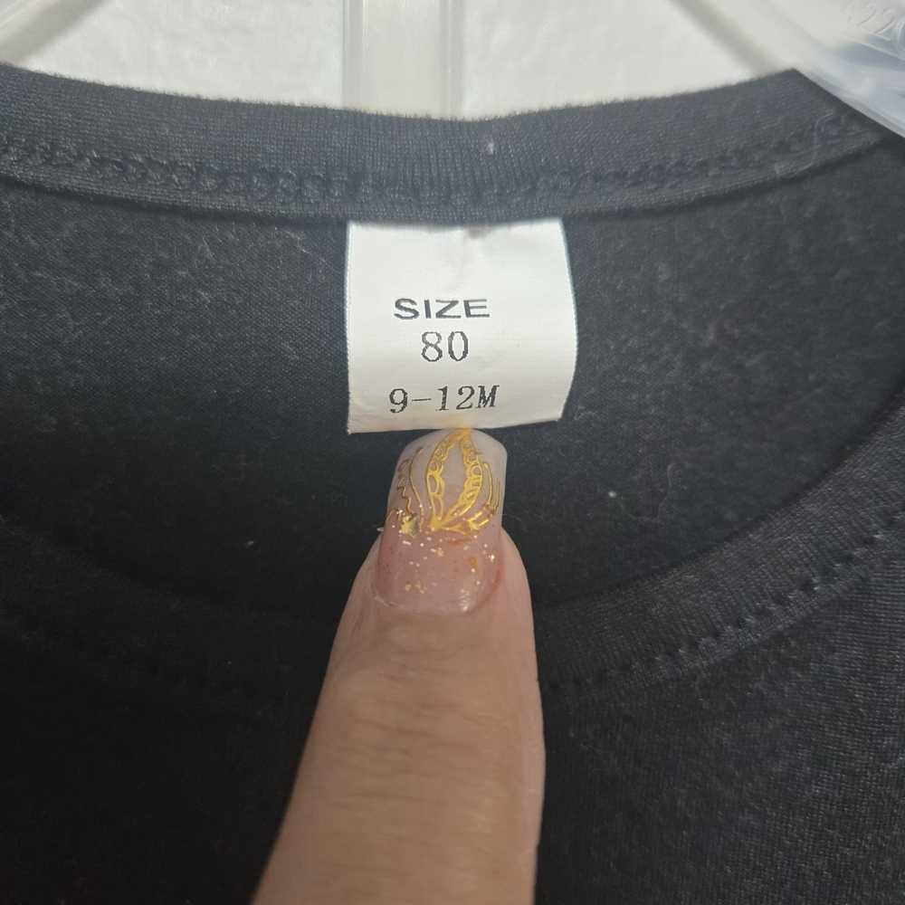 Kids Black Matching Set. Beautiful And Stylish Kitty Shirt With Some Shorts.